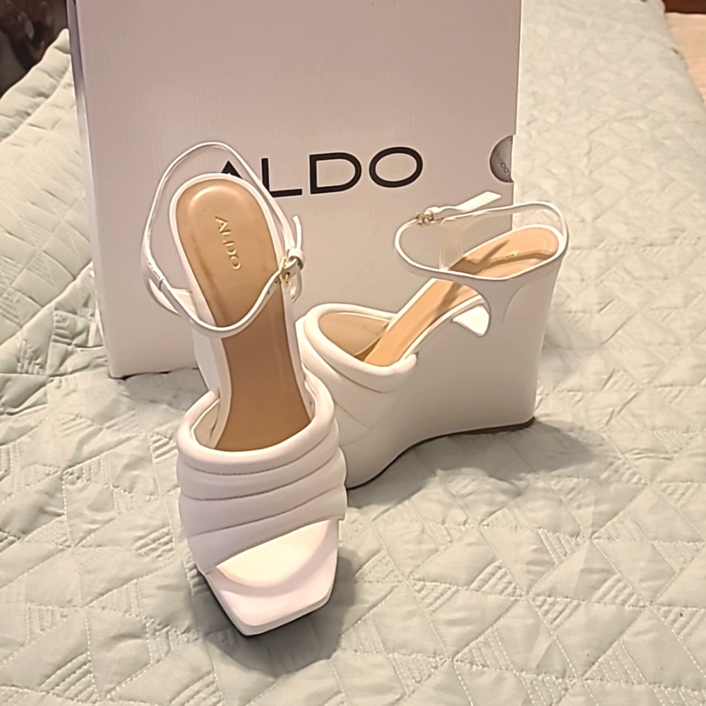 Brand new ALDO White platforms Size 9